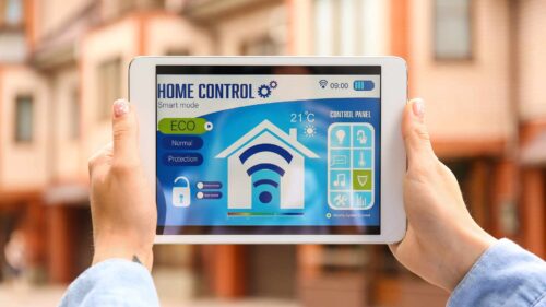 woman using application of smart home automation